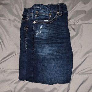 dark-wash ripped jeans